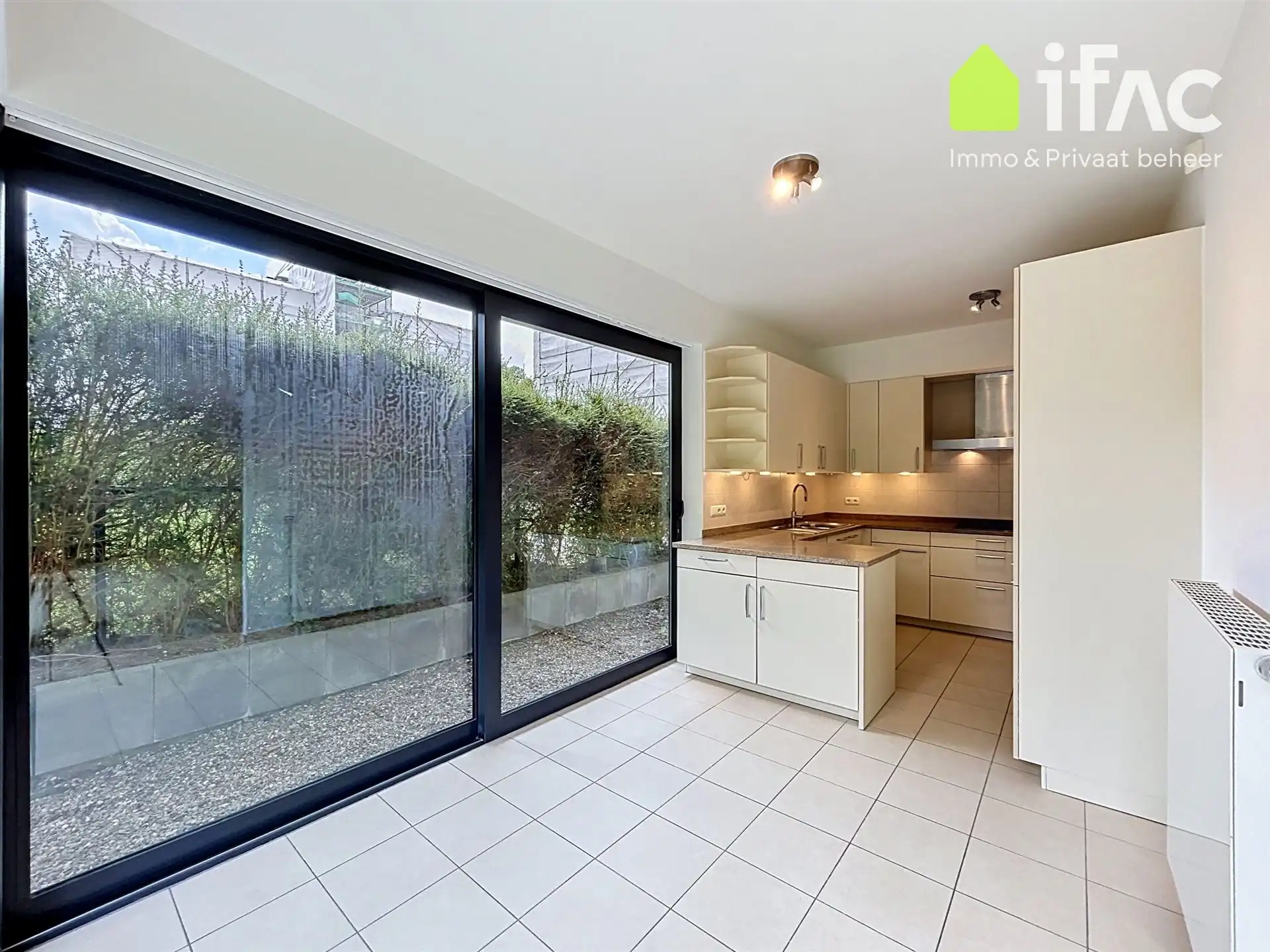 Exclusief gelijkvloers appartement met 2sk en privé tuin foto 8