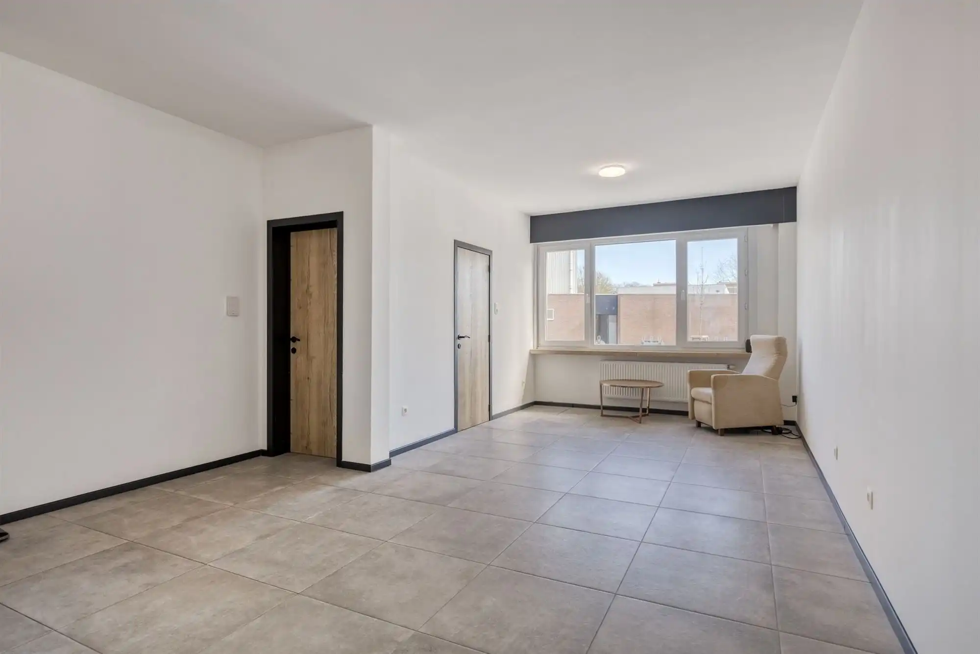 Ruime kangoeroe woning met 5 slk + 2 badk + terras in Lier foto 2