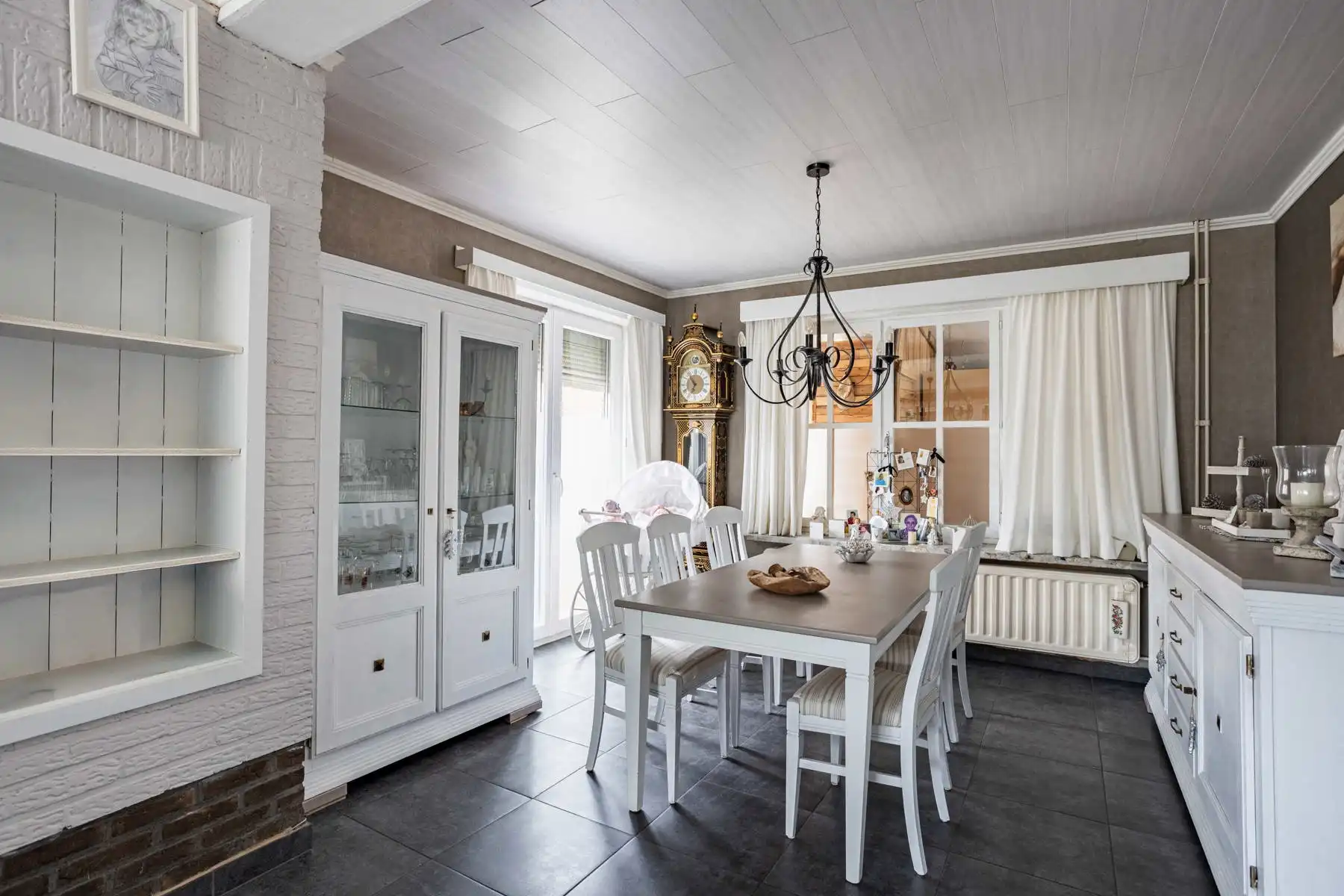 Leuke half-open bebouwing met grote tuin! foto 6