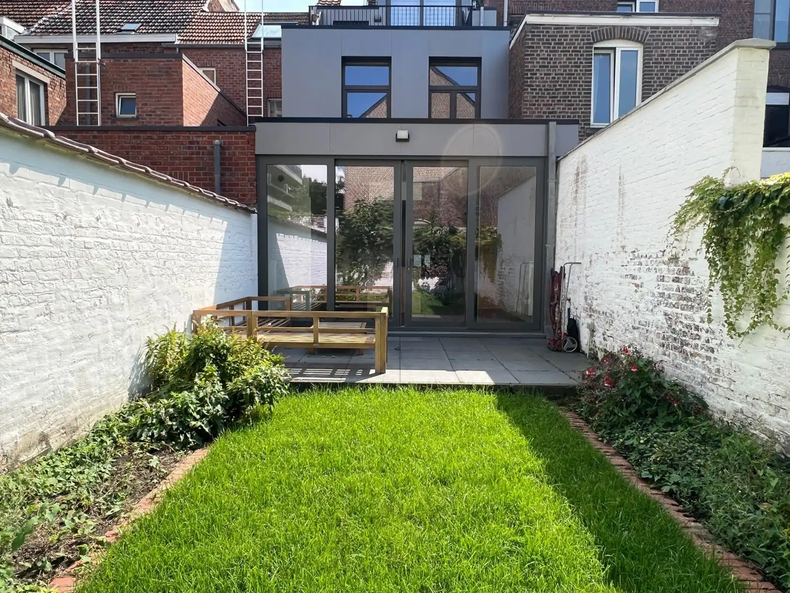 Gerenoveerd duplex appartement met tuin in centrum Leuven te huur foto 2