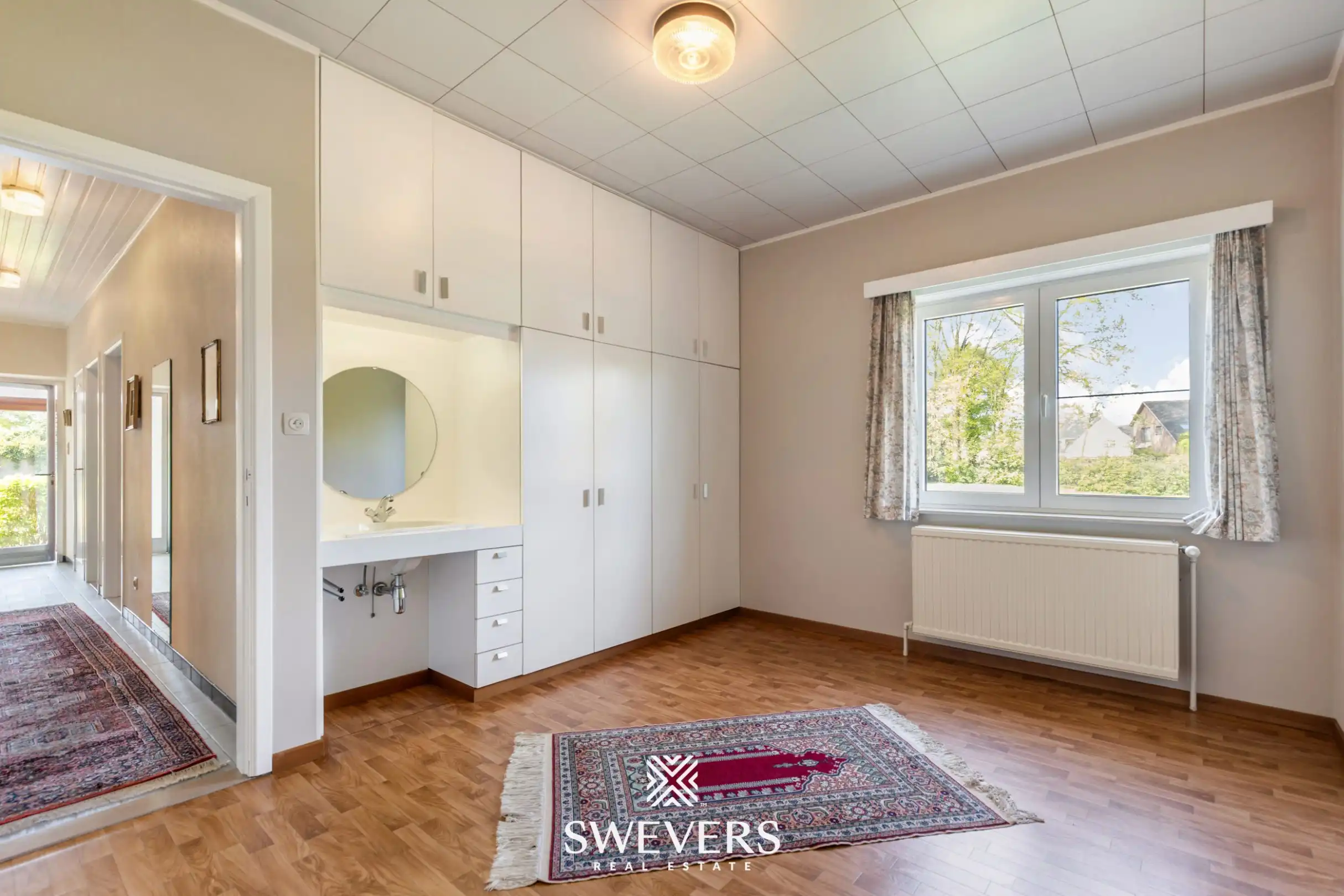 Volledig gelijkvloerse woning met 3 slaapkamers, tuin en ruimte in Kuringen (Hasselt) foto 7