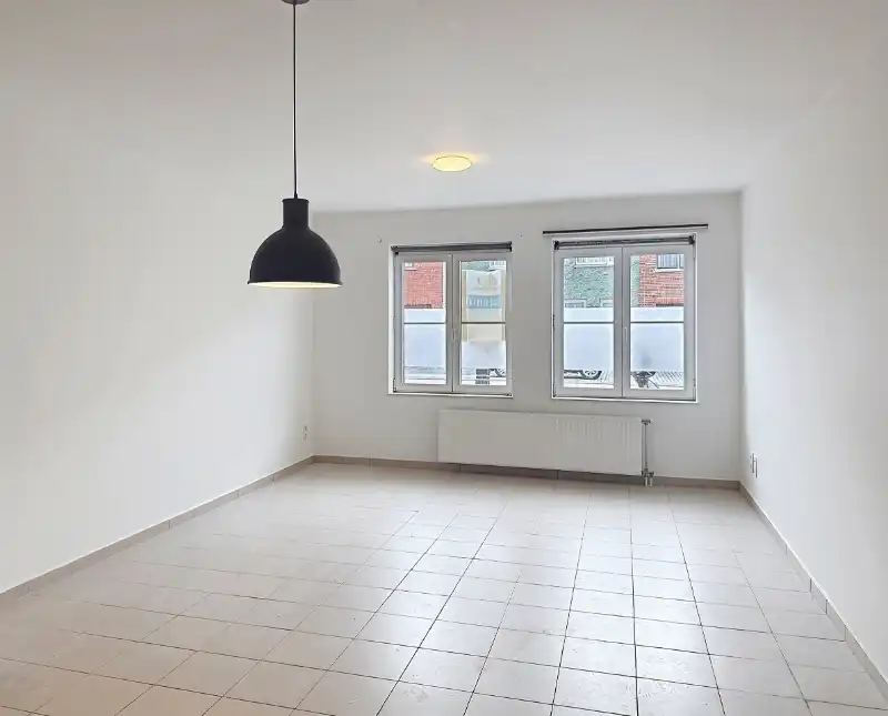 Gelijkvloers appartement met 2 slaapkamers en tuin foto 2
