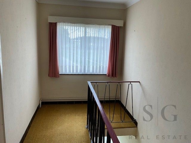 Te renoveren vrijstaande woning op ruim perceel tussen Bocholt en Bree – rust en potentieel op meer dan 32 are foto 11