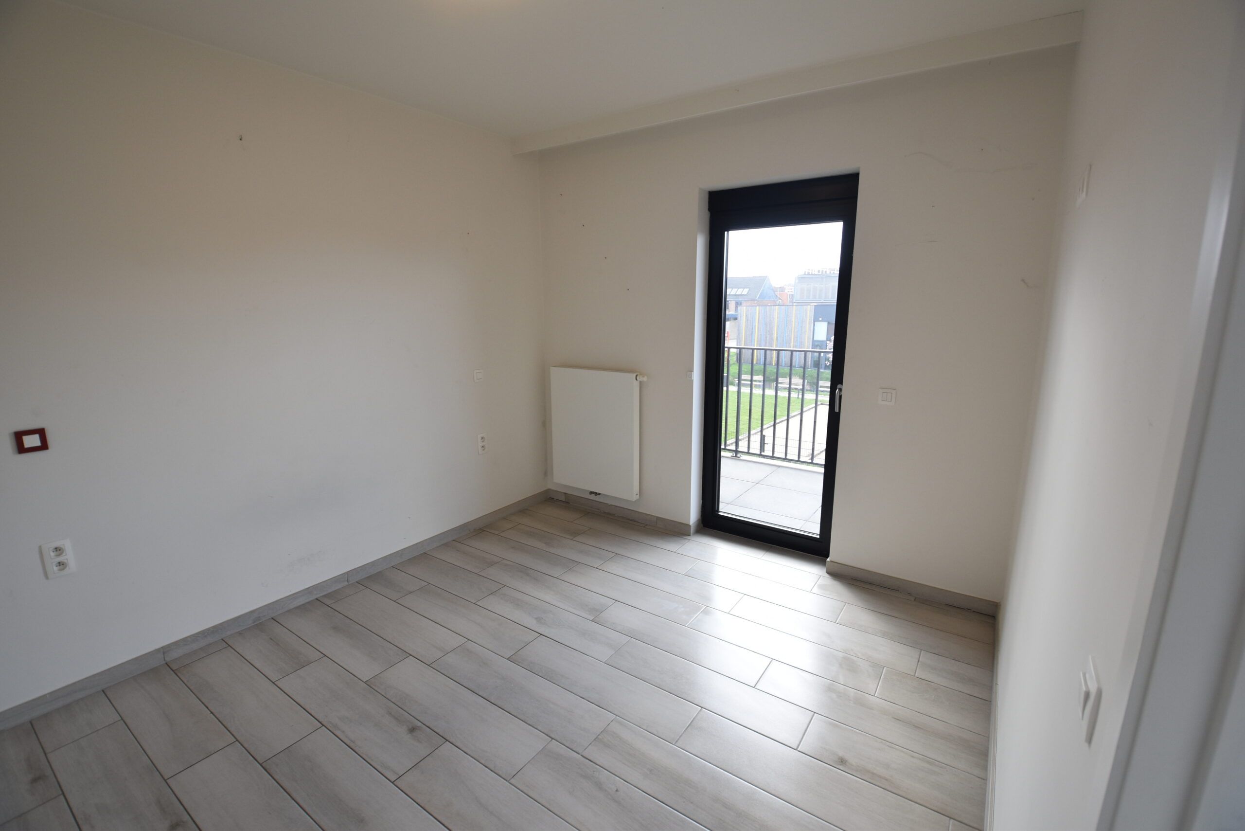 Assistentiewoning met 1 slaapkamer, berging en autostaanplaats in Sint-Niklaas foto 7