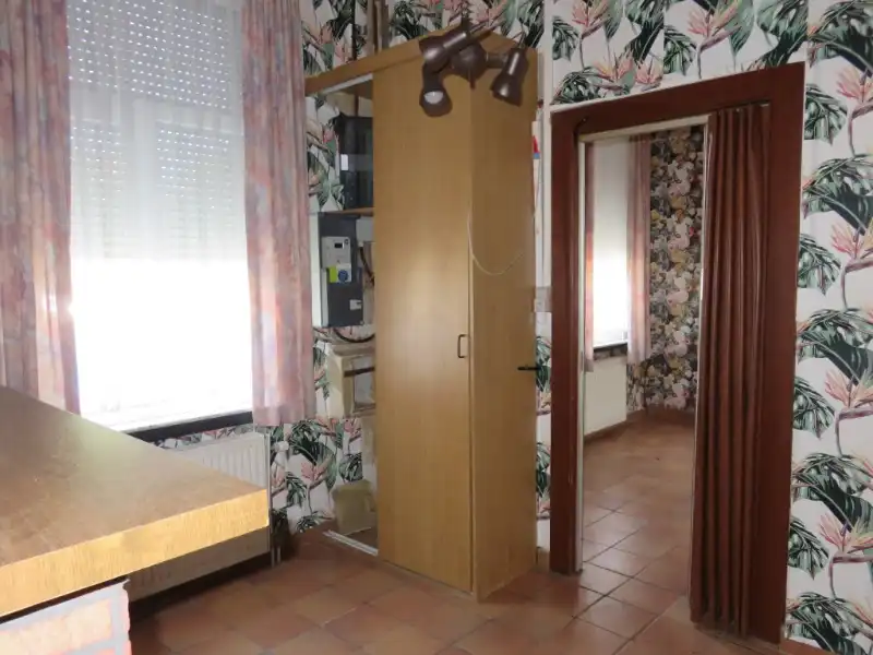 Totaal te renoveren woning op groot perceel van ca. 1270m² foto 14