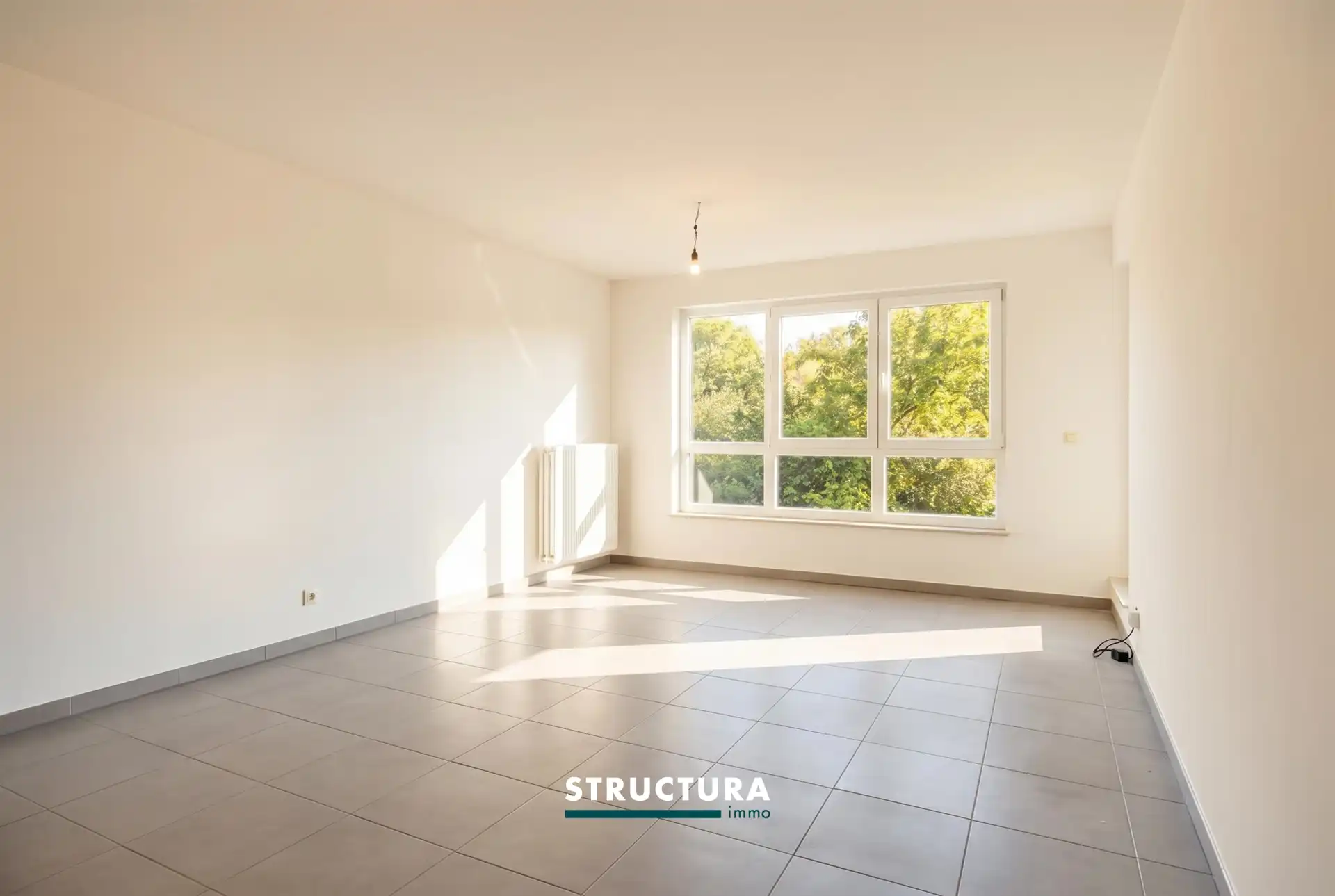 Te koop – Instapklaar appartement met 2 slaapkamers in hartje Laken. foto 2