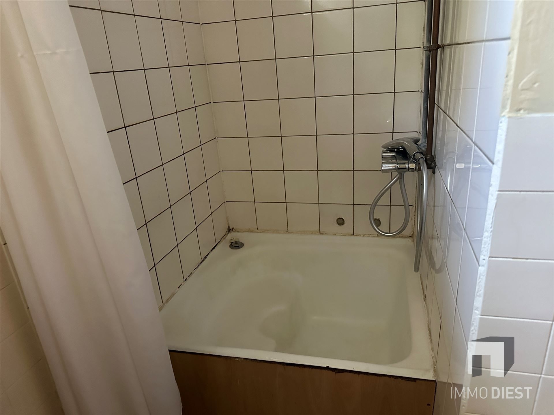 Leuke woning met tuin nabij het centrum - op te frissen foto 11