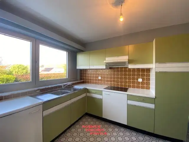 Opbrengsteigendom met 6 appartementen en 7 garages  foto 18