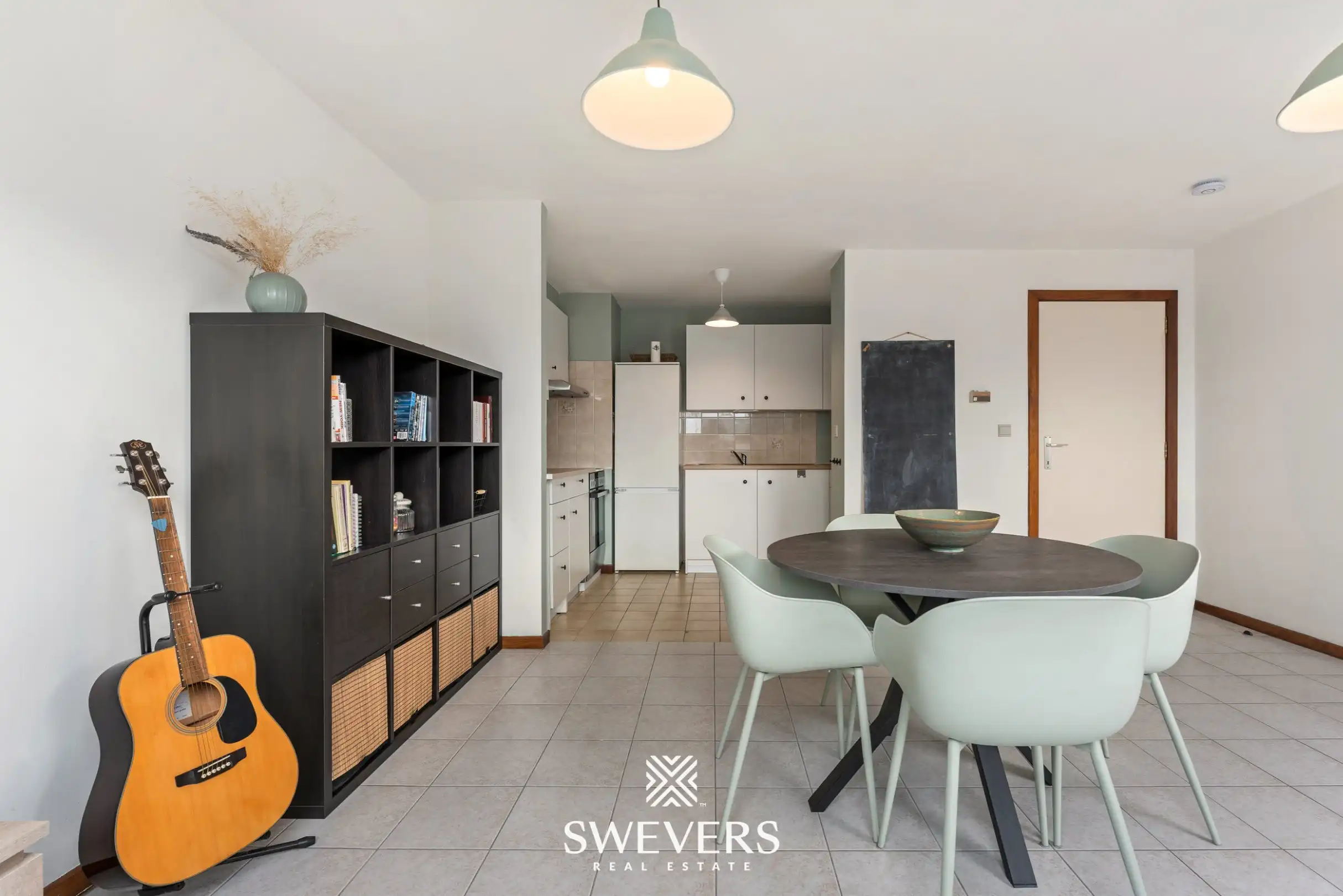 Instapklaar en lichtrijk 1-slaapkamerappartement op topligging in Houthalen centrum foto 6