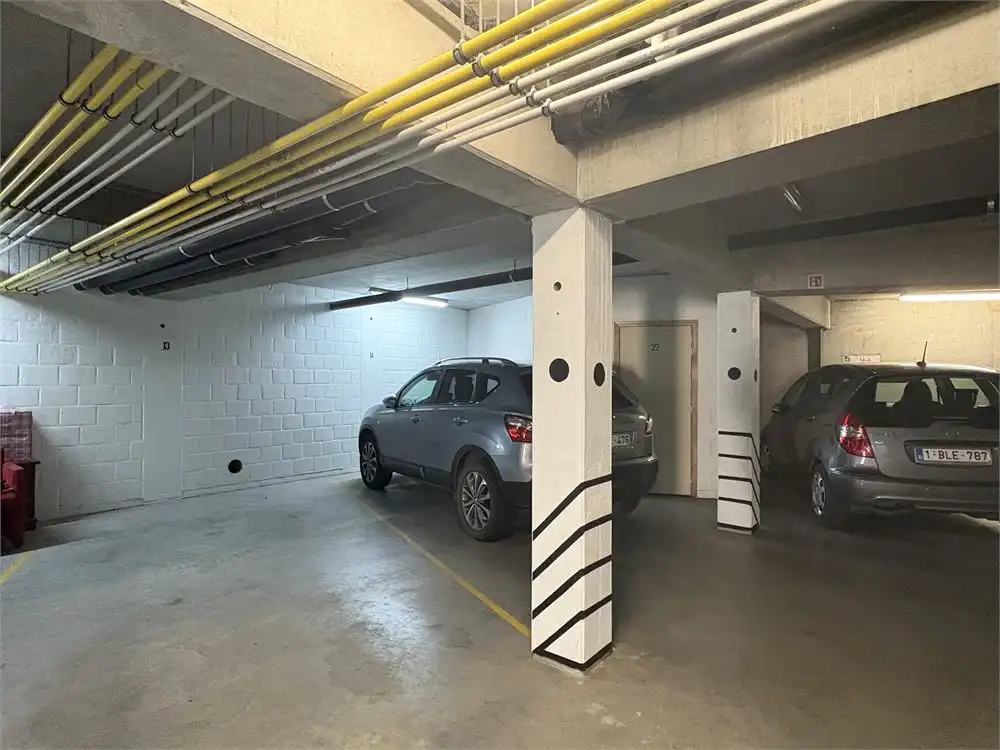 Gelijkvloers appartement met twee slaapkamers + autostaanplaats foto 9