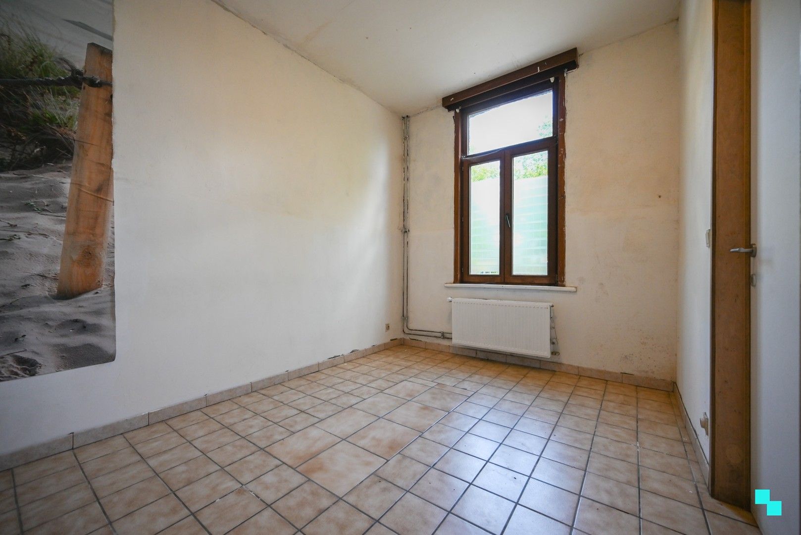Te renoveren eengezinswoning gelegen op een perceel van ca. 300 m² foto 4