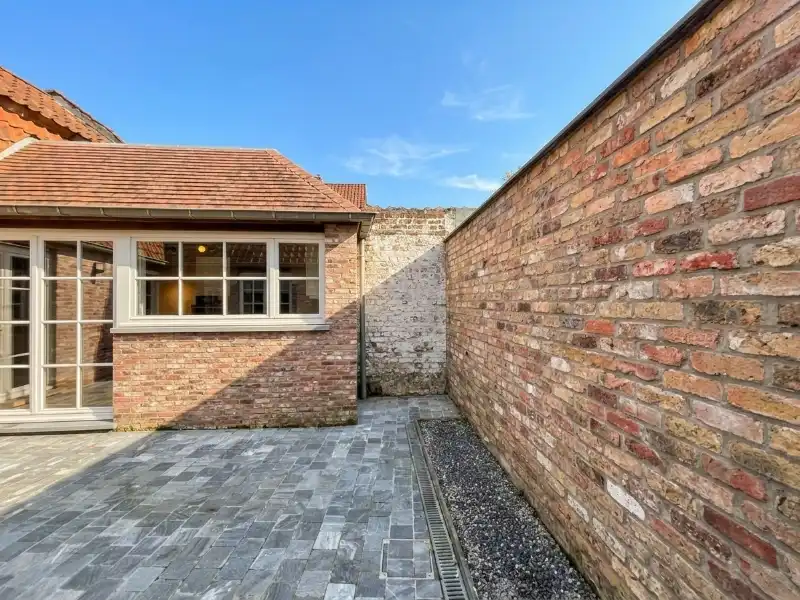 Vernieuwbouw met 2 slaapkamers + ruim TERRAS te huur in Brugge foto 15