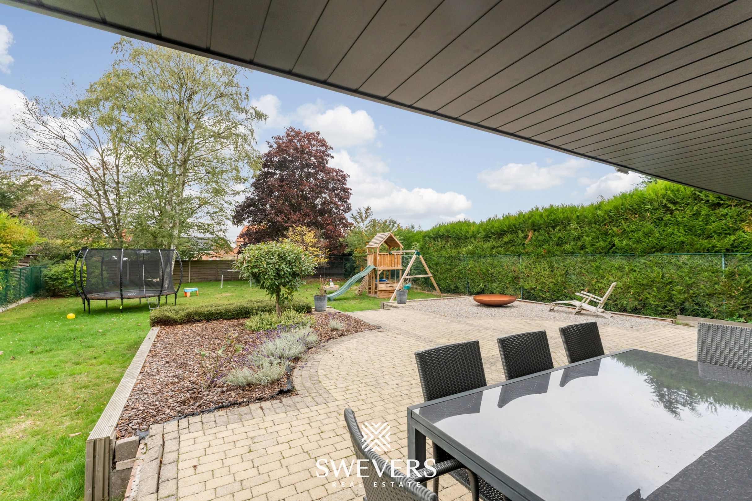 Knusse, hedendaagse gezinswoning met warme indeling en grote, zonnige tuin foto 44