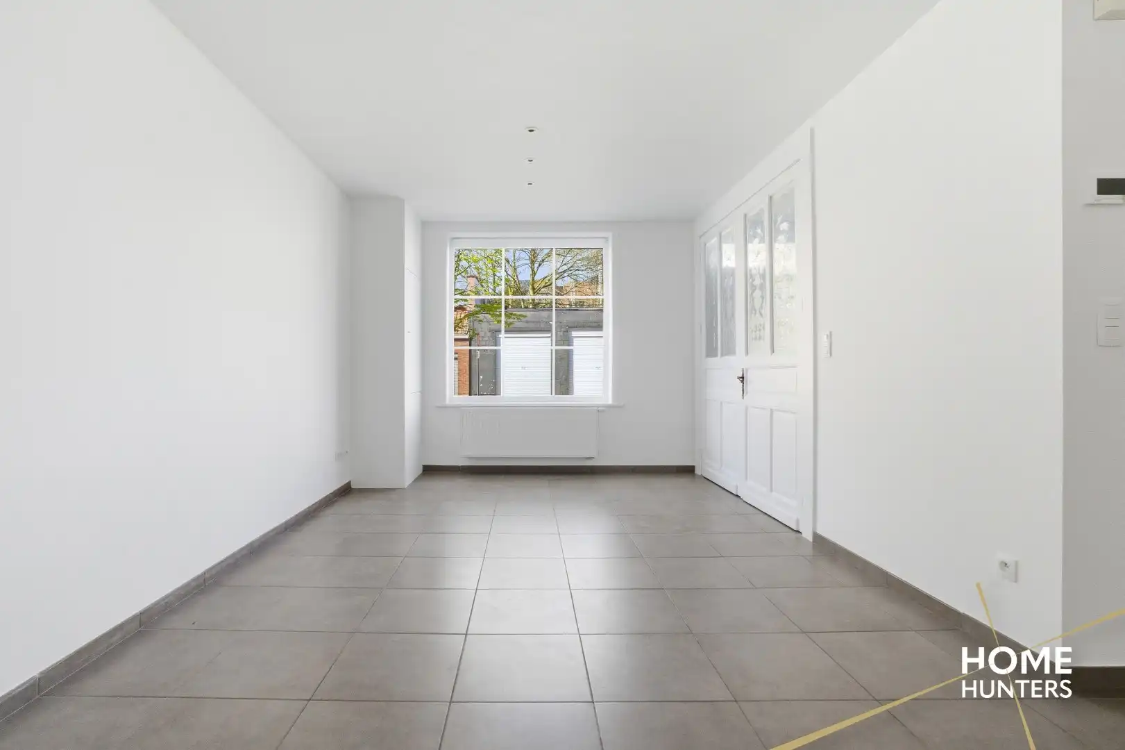 Charmante en instapklare woning met unieke stadskoer en garage foto 4