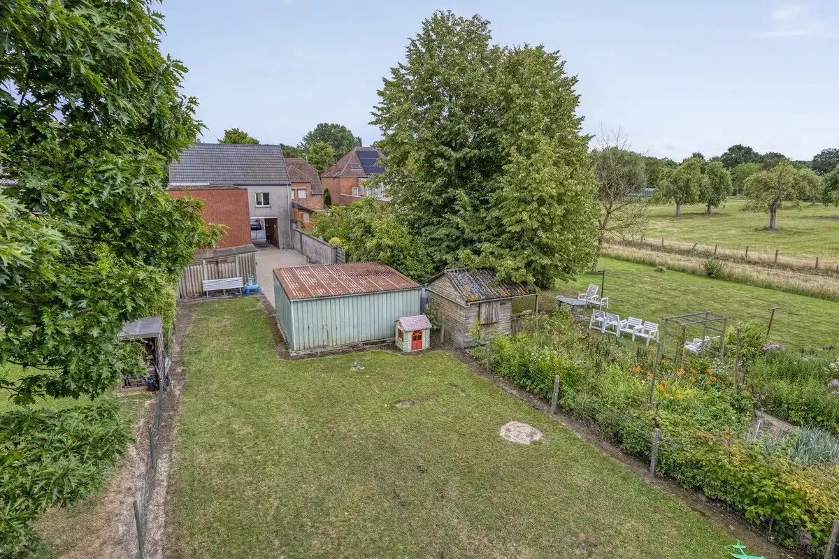OPBRENGSTEIGENDOM BESTAANDE UIT TWEE RUIME EN VERHUURDE APPARTEMENTEN IN HERK-DE-STAD foto 11