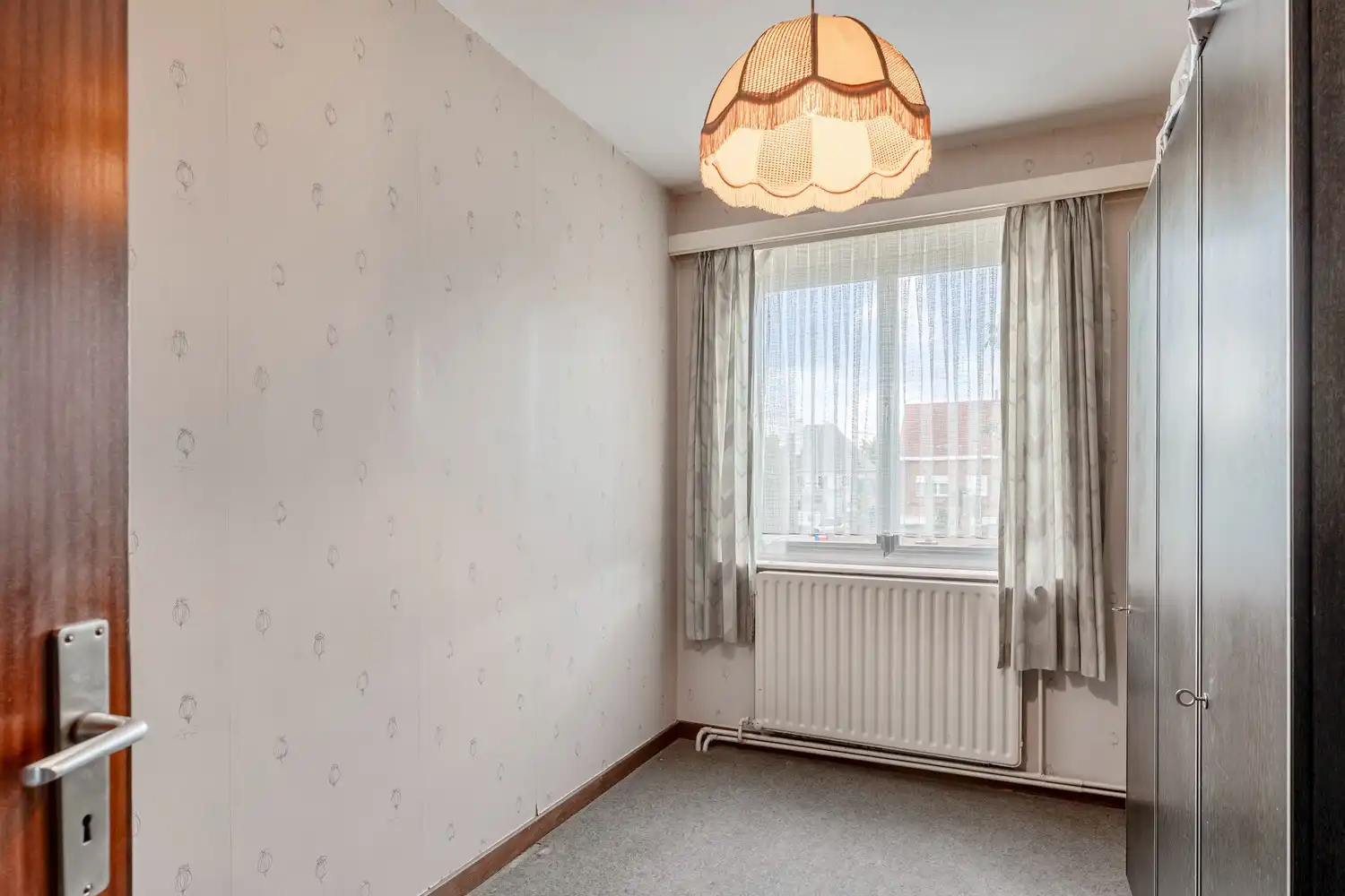 Zeer goed onderhouden en instapklare woning met drie slaapkamers, gezellige stadstuin en achter gelegen garage te Wijgmaal ! foto 16