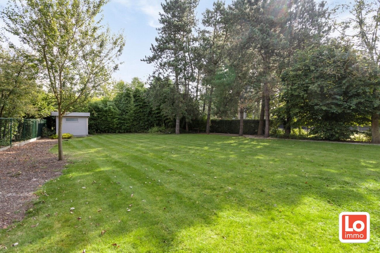 Schitterend gelegen moderne villa met praktijkruimte op een TOP ligging in de rust van de ‘Kasteeldreef’ en toch pal in centrum van Lochristi. foto 45