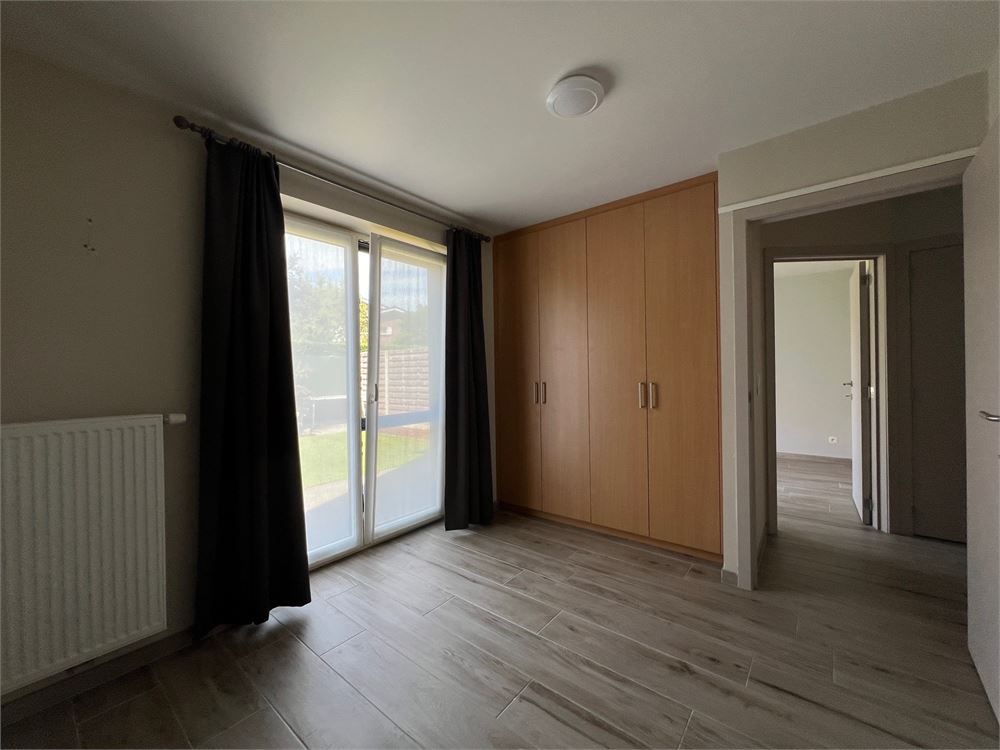 Instapklaar gelijkvloers appartement met 2 slaapkamers en tuin. foto 8
