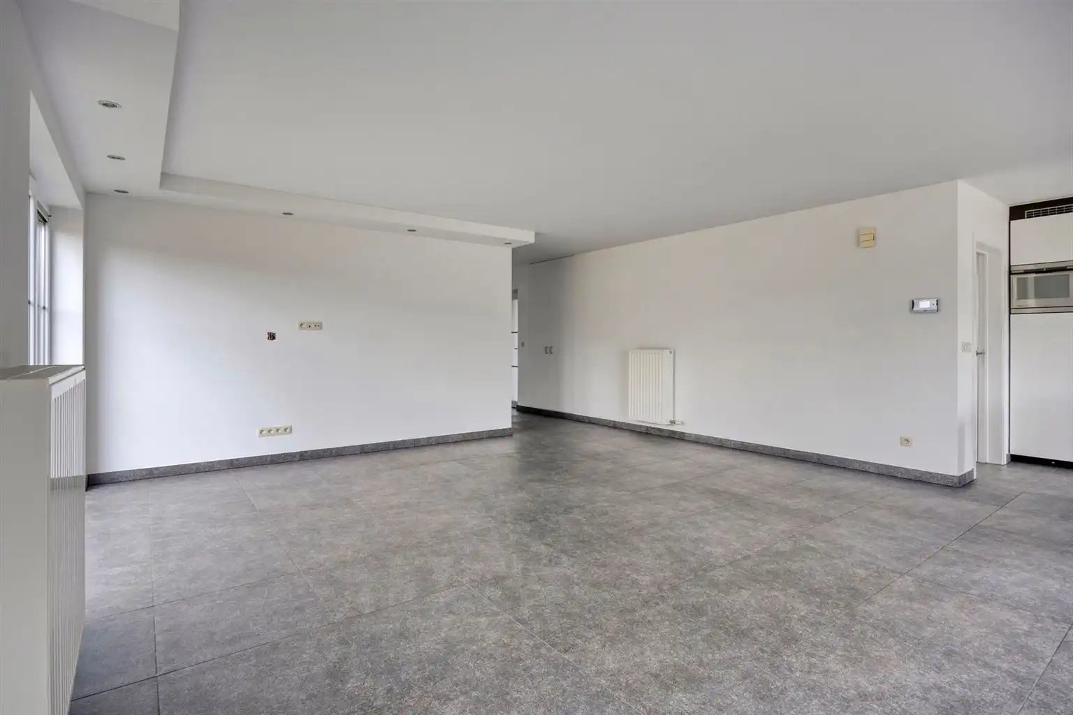 Instapklaar gelijkvloers appartement met 2 slaapkamers, ruime tuin en parkeergelegenheid op een rustige toplocatie in Opitter.  foto 4