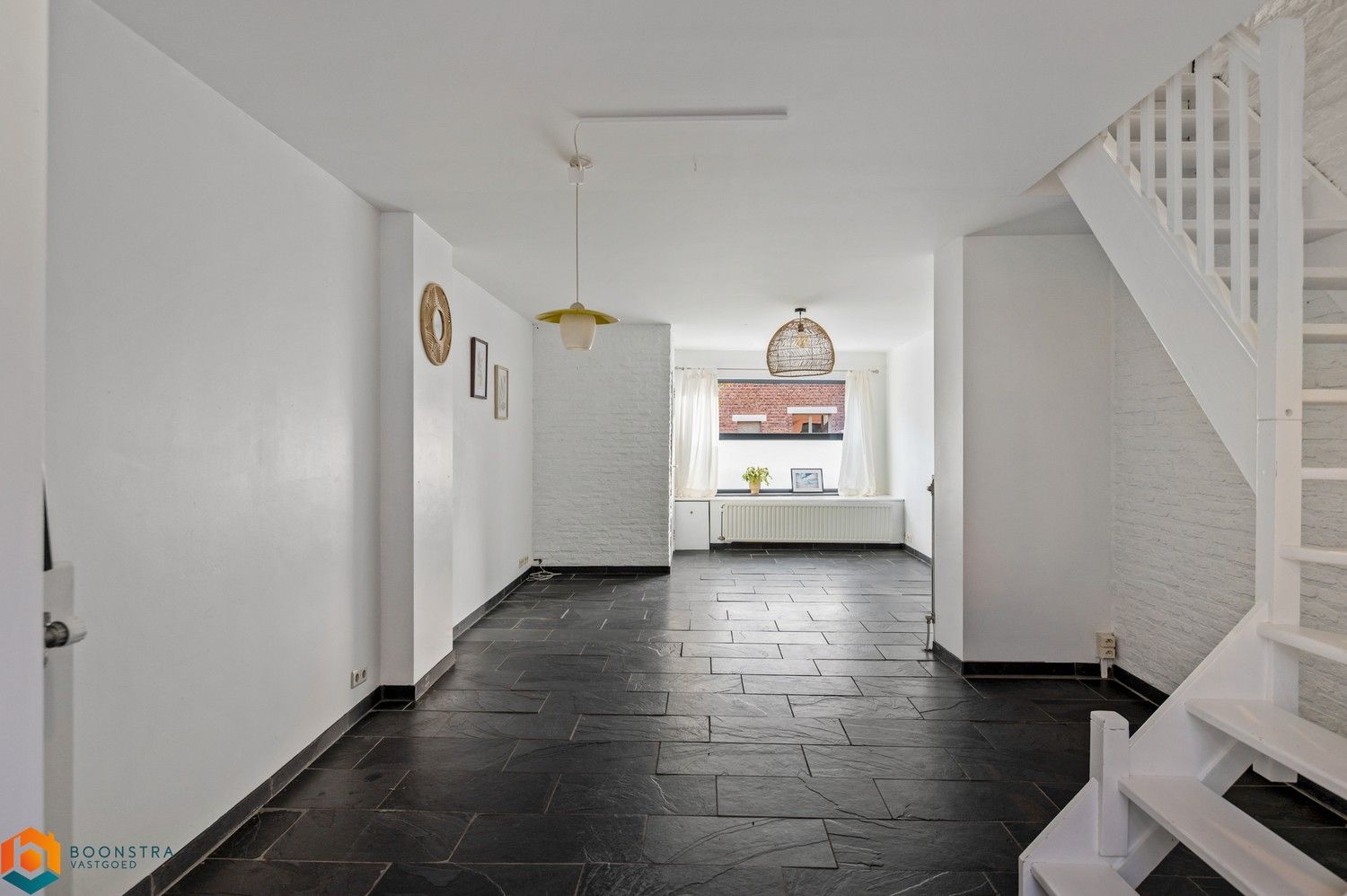 Gerenoveerde gezinswoning met 3 slpkrs en tuin in Mechelen foto 4