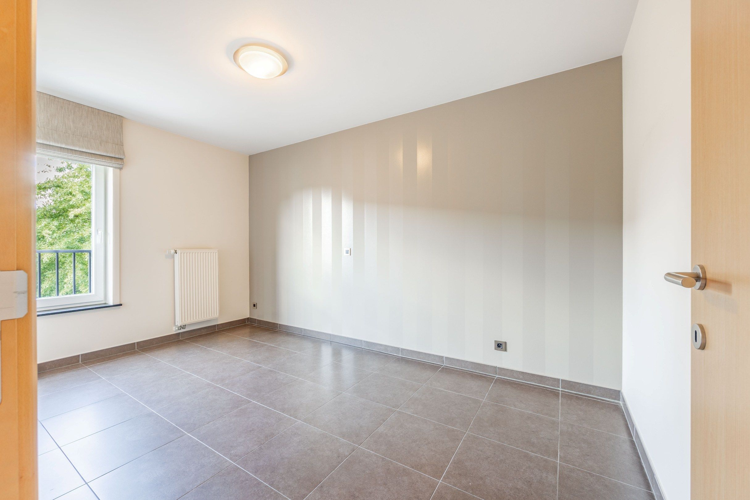 RECENT APPARTEMENT MET PRACHTIG ZONNETERRAS EN DUBBELE GARAGE foto 13