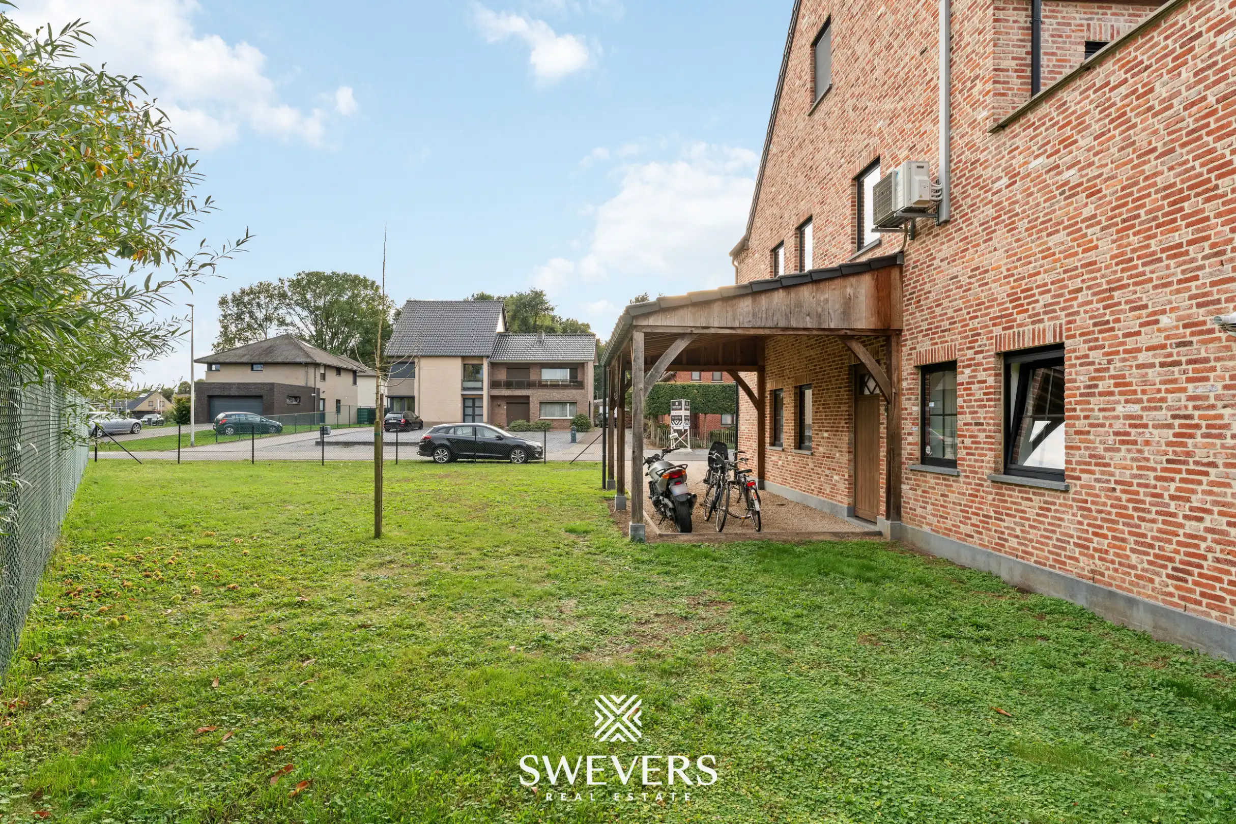 Instapklaar gelijkvloers 2 slpk-appartement met terras en tuin in Heusden. foto 21