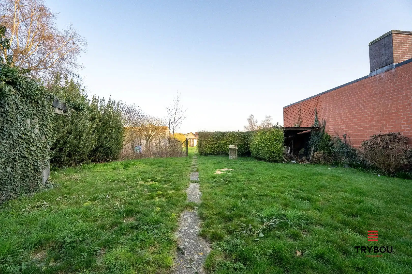 Te renoveren woning met garage en diepe tuin foto 17