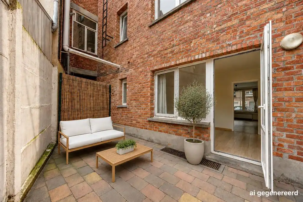 Instapklaar gelijkvloers appartement met gezellige koer foto 10