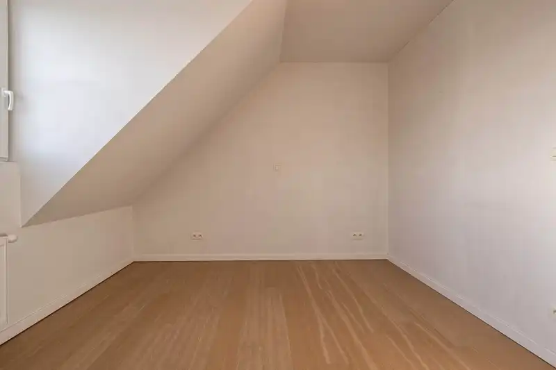 Jong, energiezuinig en modern tweeslaapkamer appartement met mooi terras op de tweede verdieping van residentie Aimé en André in hartje Waregem! foto 9