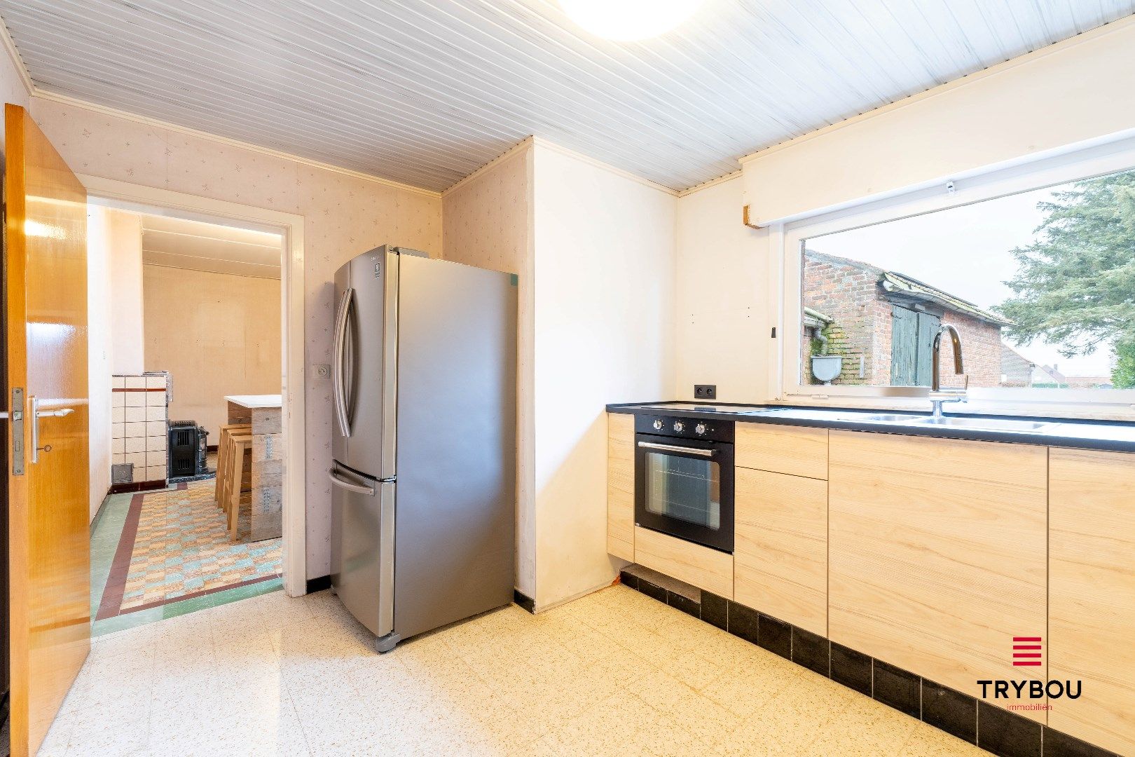 Authentieke hoeve met bijgebouwen op ruim perceel foto 9