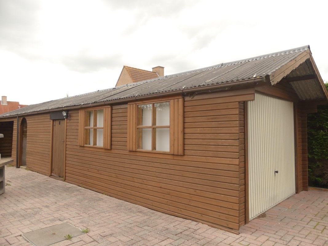 Alleenstaande woning met tuin en 2 garages foto 13