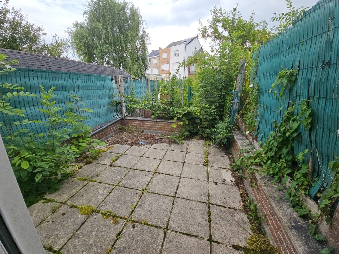 Te renoveren rijwoning nabij de Oudenberg foto 2
