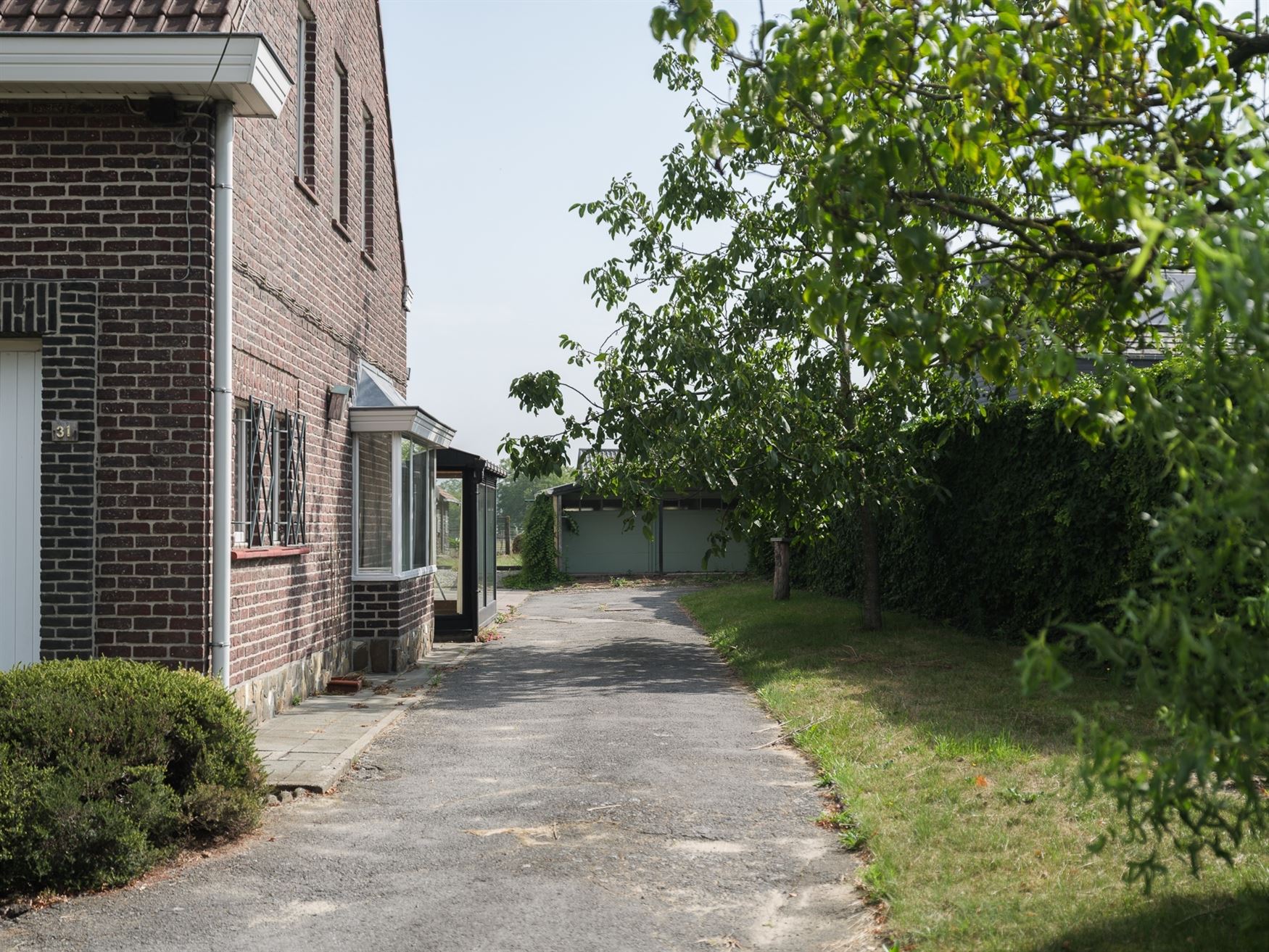 Halfopen renovatieparel in hartje Sint-Martens-Latem foto 3