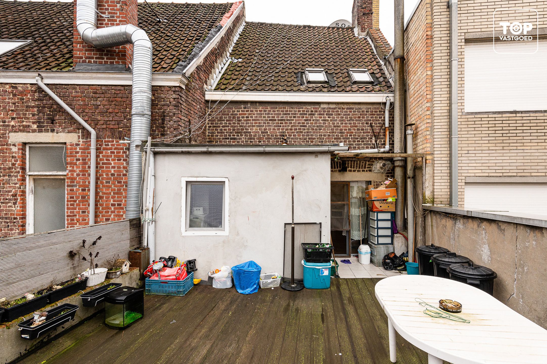 DISCREET Centraal gelegen (opbrengst) eigendom met verhuurd handelsgelijkvloers en 2-slaapkamer woonst foto 28