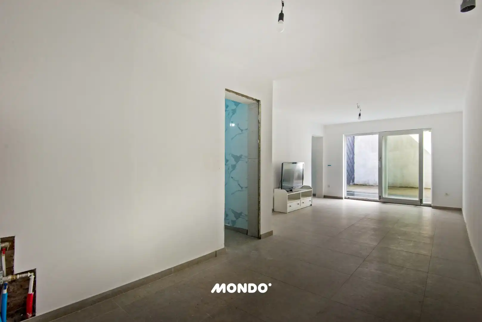 Commercieel gelegen opbrengsteigendom met handelsgelijkvloers, appartement en studio in het centrum van Willebroek! foto 11