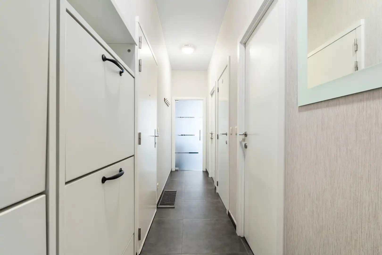 Instapklaar gelijkvloers appartement met ruim terras foto 9