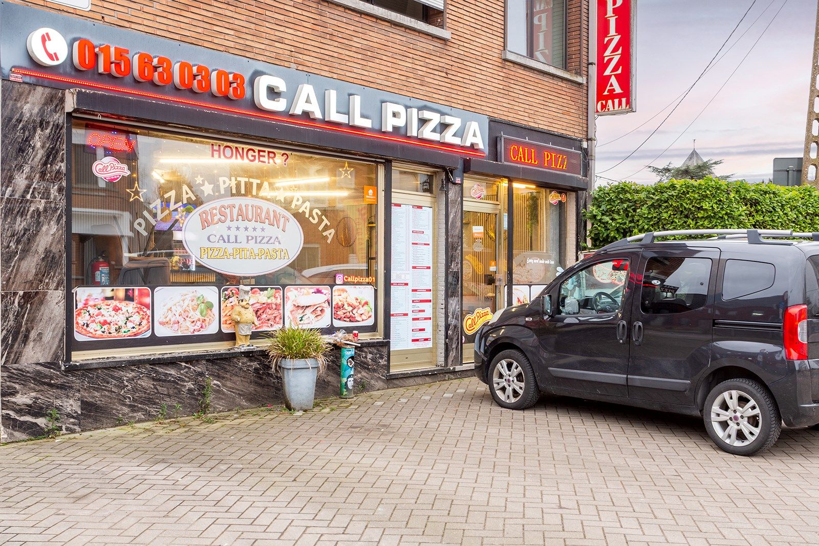 Handelspand met duplex appartement en garage op toplocatie foto 2
