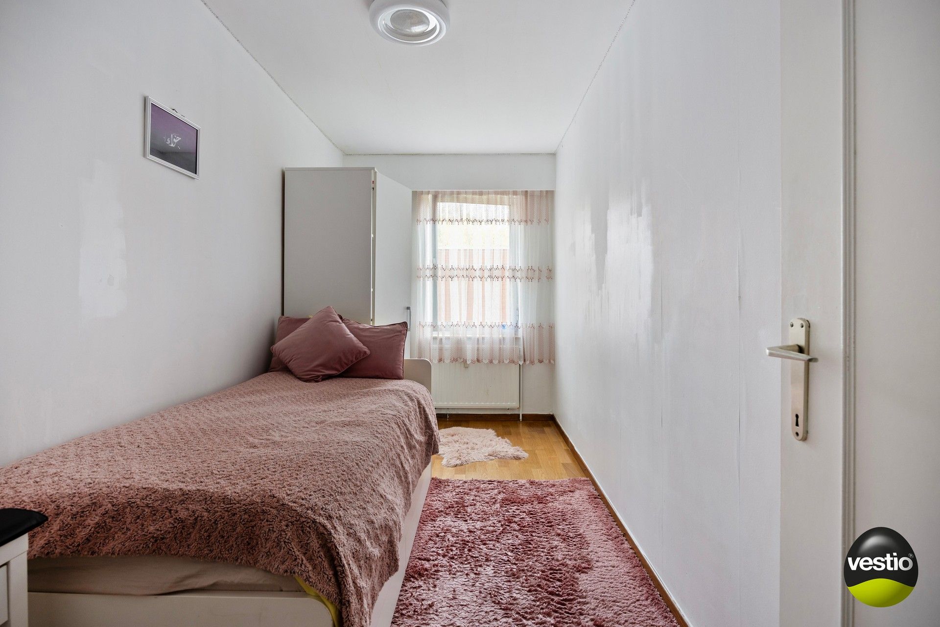 Te renoveren 3-slaapkamerappartement met garagebox en kelder. foto 10