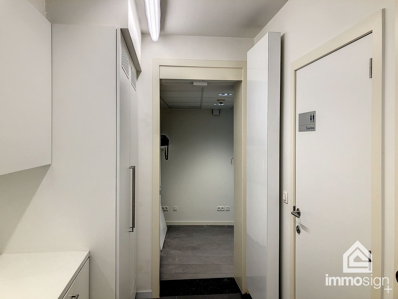 Ruime kantoorruimte met aanpalend bankcontact in het centrum van Kaulille! foto 12
