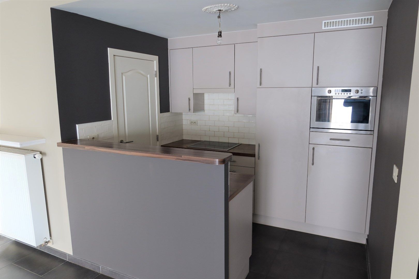 Gelijkvloers app met 2 slk, tuin en garage foto 6