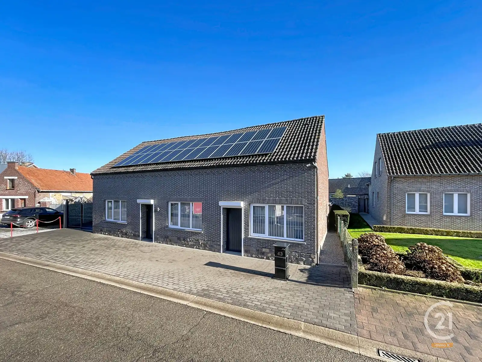 Hoofdfoto van de publicatie: Degelijke, veelzijdige woning met ruime tuin van 12a35ca.