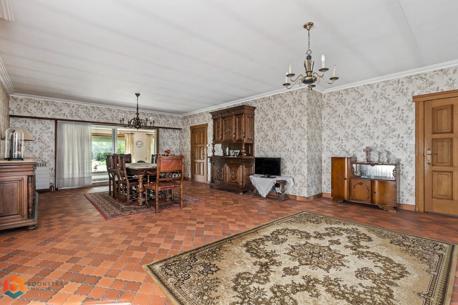 Te renoveren woning met 3 slpkrs op een ruim perceel foto 4