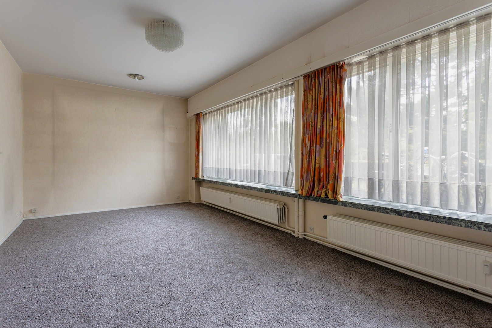 Gelijkvloers appartement (142m²) met 2 slpk & mogelijkheid tot aankoop garage of staanplaats! foto 13