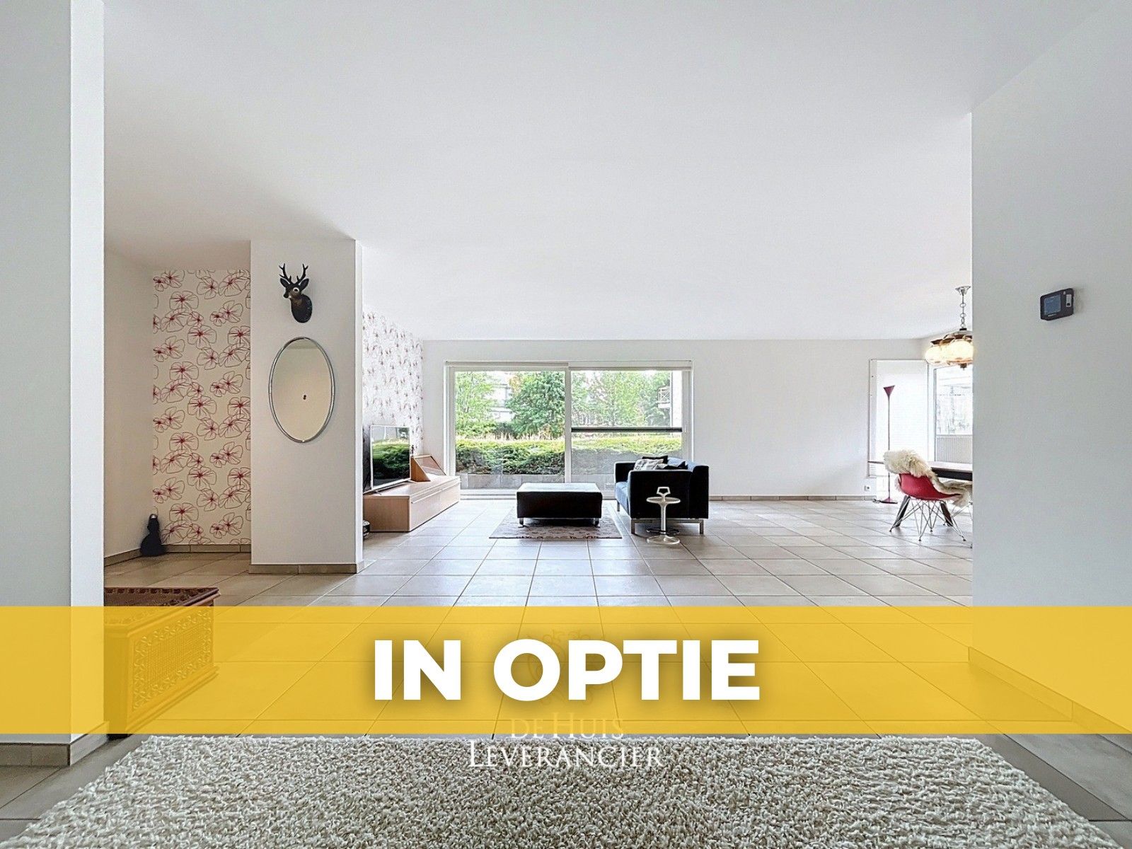 IN OPTIE - Ruim gelijkvloersappartement met 3 slaapkamers en garagebox te koop in Kontich foto {{pictureIndex}}