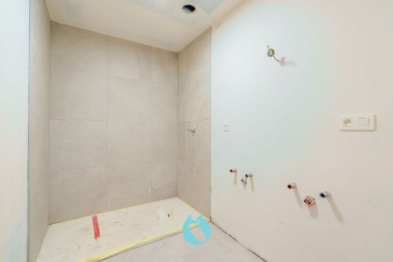 Green Square presenteert u 35 nieuwbouwappartementen en een winkelpand, letterlijk ónder de Kerktoren van Sleidinge. foto 6