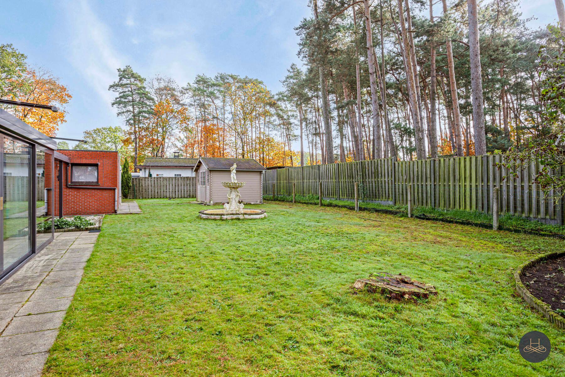 Gelijkvloerse rustig gelegen woning in een oase van groen foto 28