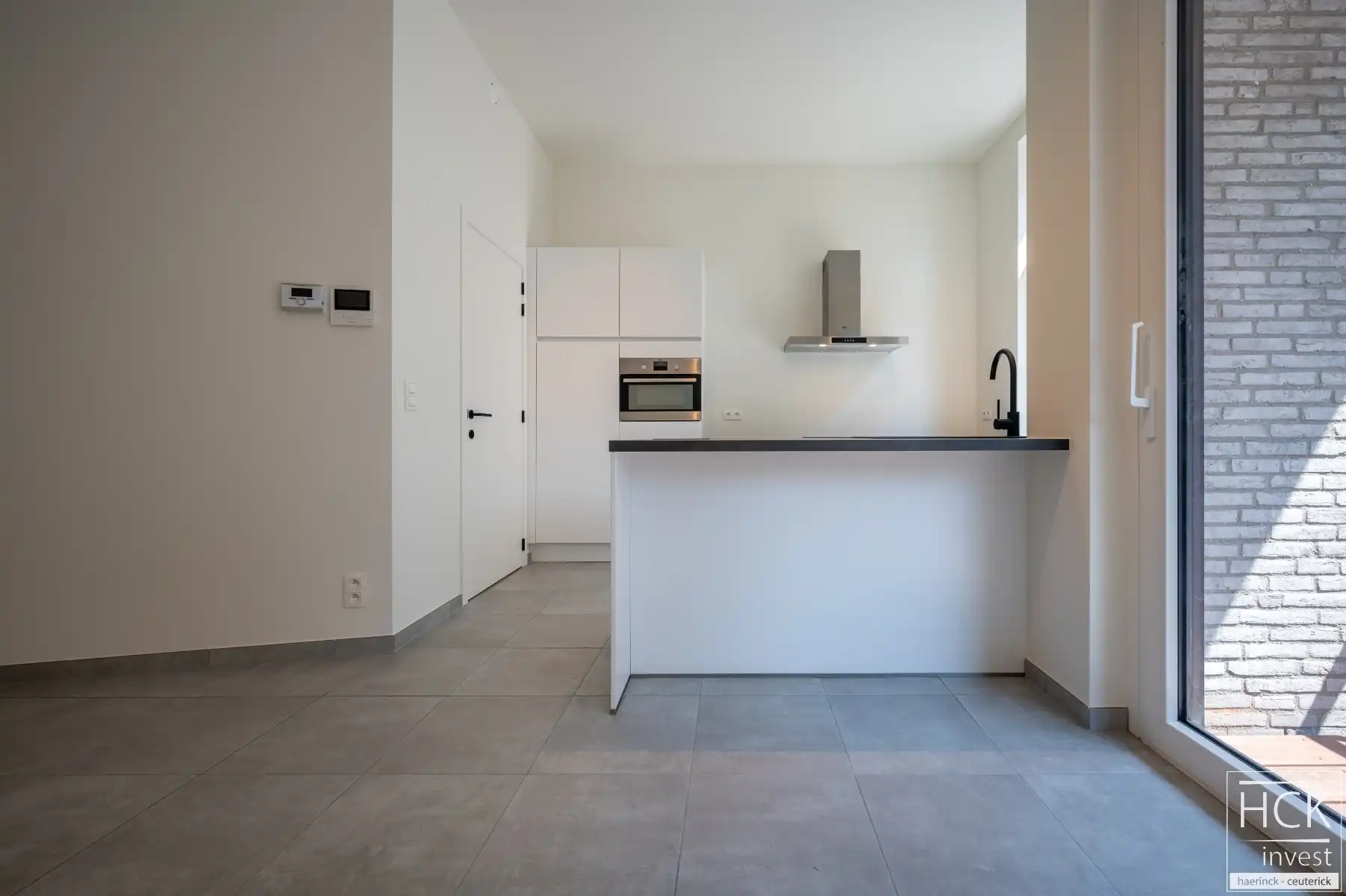 DEINZE - Nieuwbouw APP. met 2 SLPK, 2 terrassen én parkeerplaats foto 7