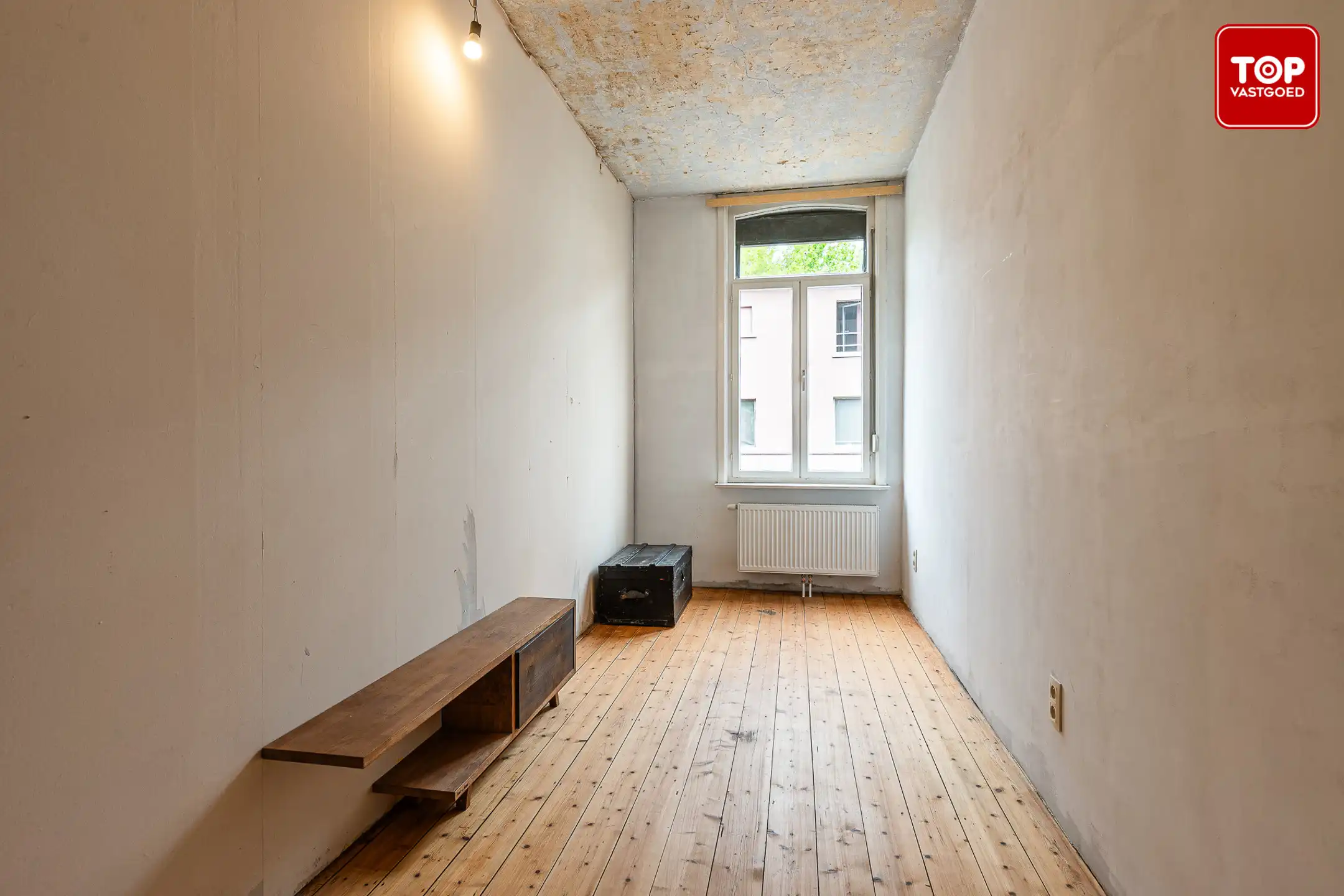 Woning met 3 slaapkamers en leuke tuin op toplocatie. foto 13