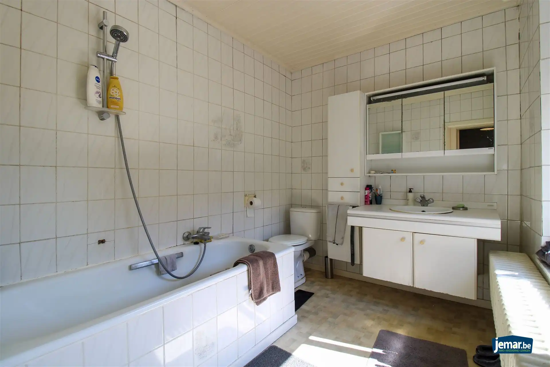 Karaktervol handelspand met woonst op toplocatie – ideaal om wonen en werken te combineren in het hart van Maasmechelen! foto 10