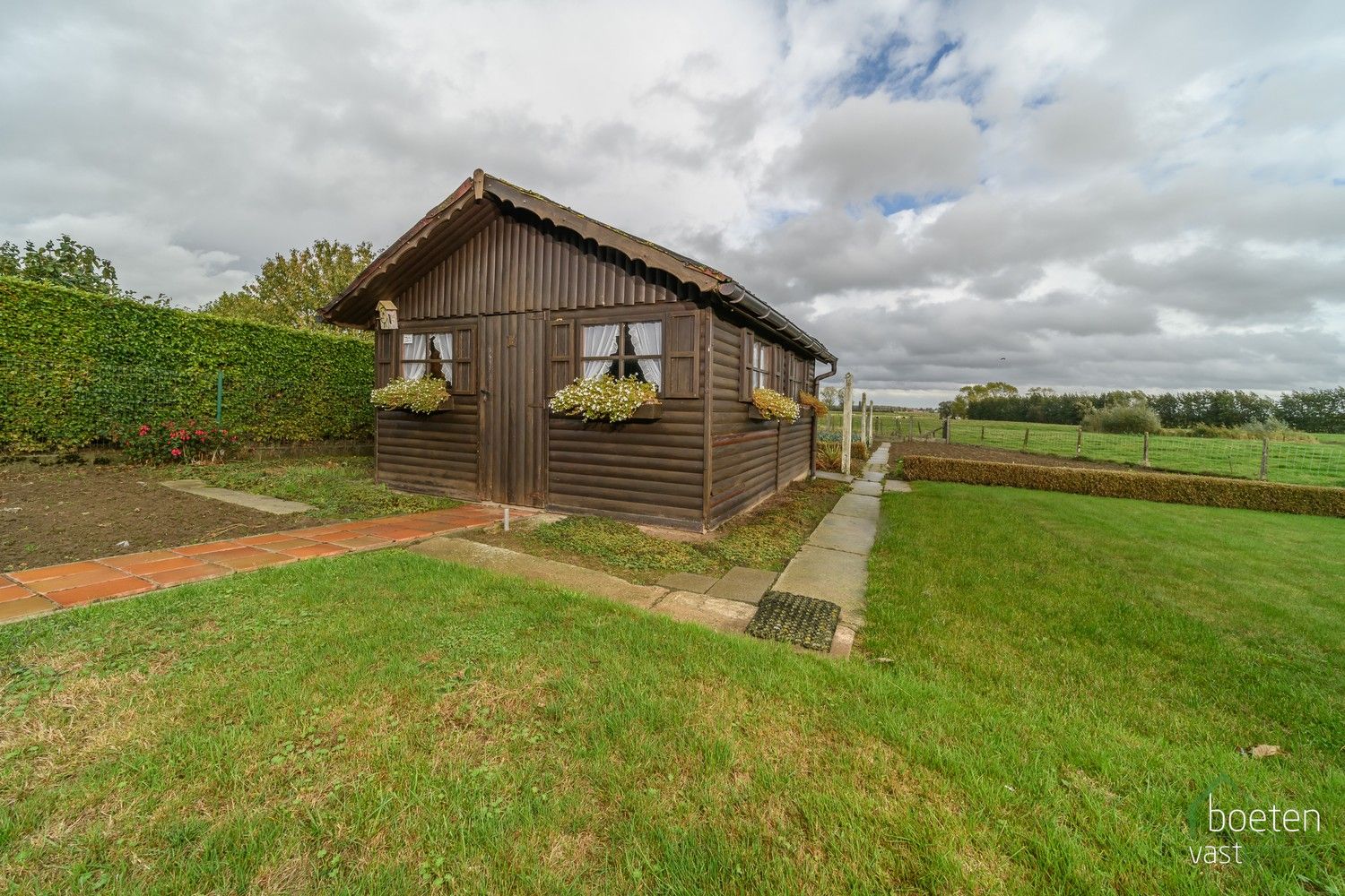 Reninge: Verzorgde gelijkvloerse woning met heel wat potentieel, fantastische tuin met open zicht op de Reningse broeken op 1.108m² totale grondopp. foto 22